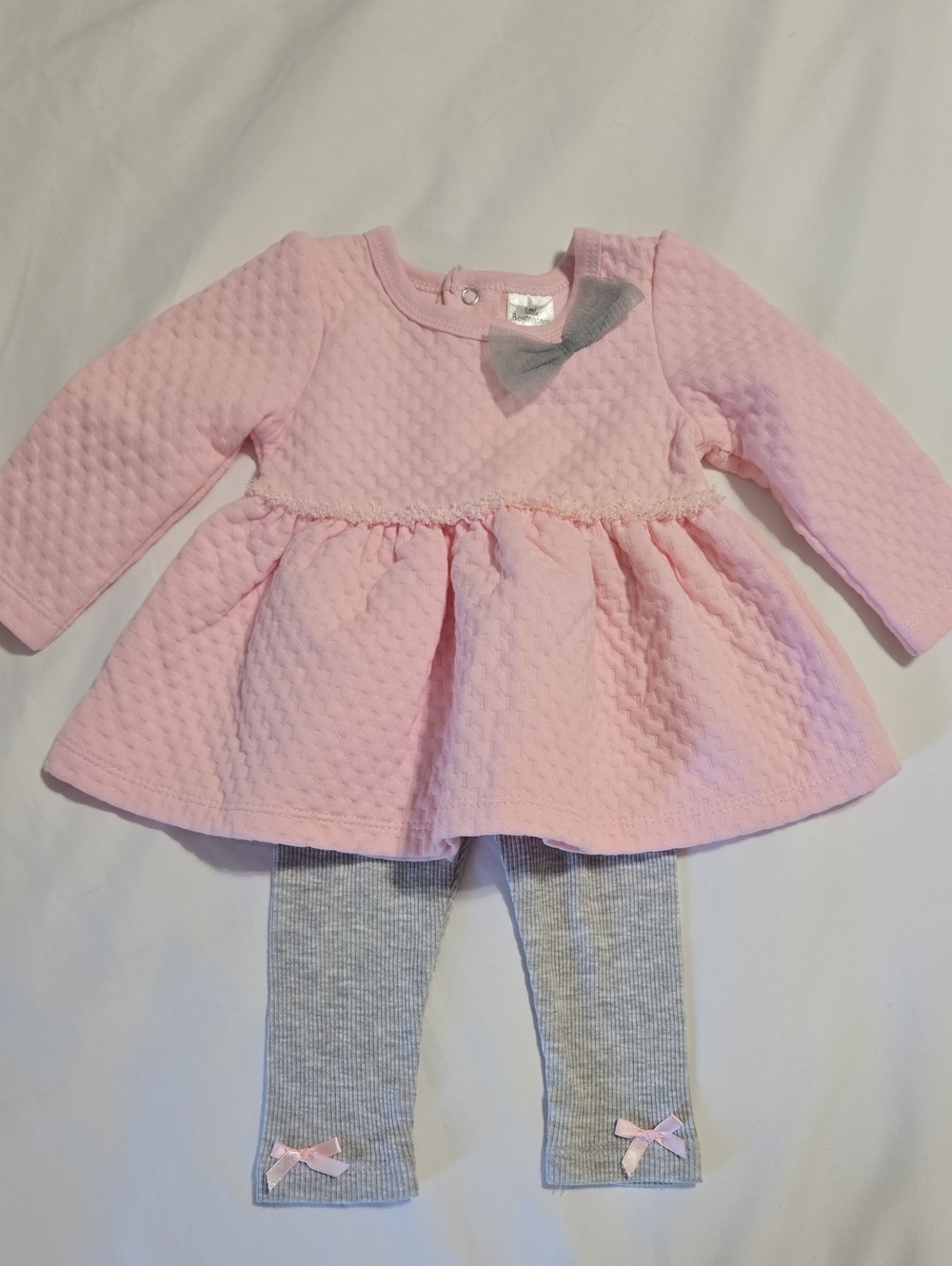 Little Beginnings pink quilted dress and grey leggings